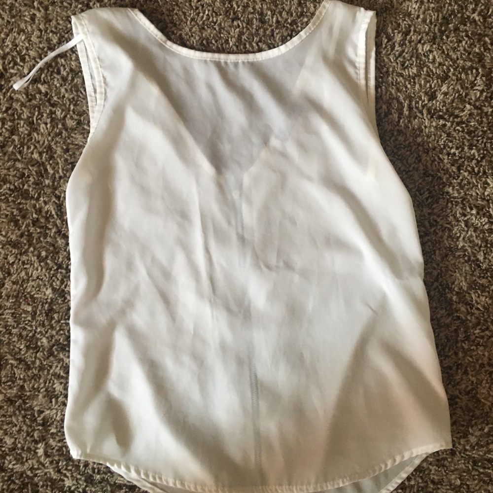 White sleeveless blouse